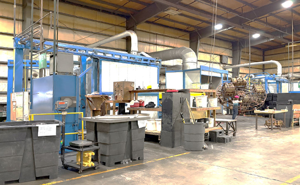 Picture of a small-sized rotational molding oven operating at RomoTech in New Paris, Indiana